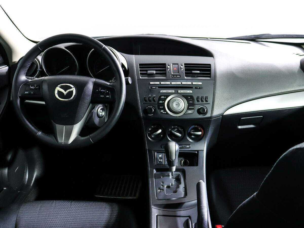 Mazda 3 с пробегом — 2012 год. Фото: #11