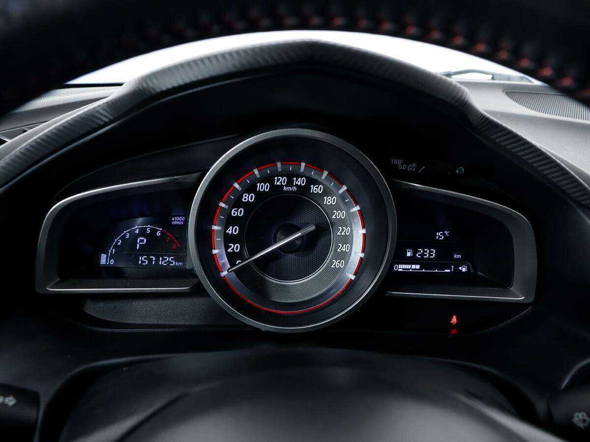 Mazda 3 с пробегом — 2013 год. Фото: #14