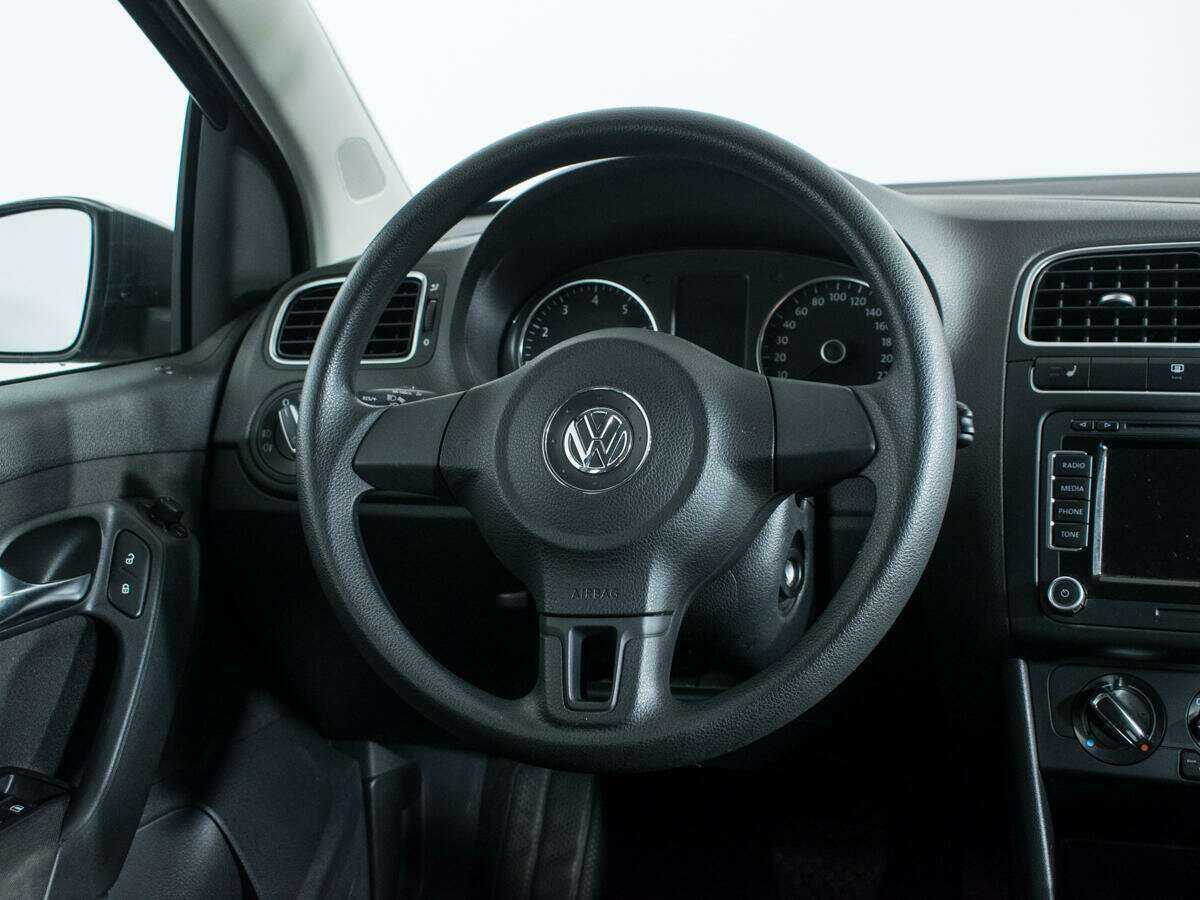 Volkswagen Polo с пробегом — 2012 год. Фото: #12
