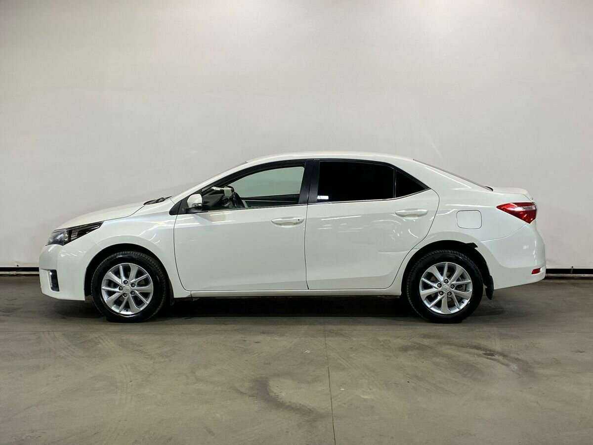 Toyota Corolla с пробегом — 2014 год. Фото: #7