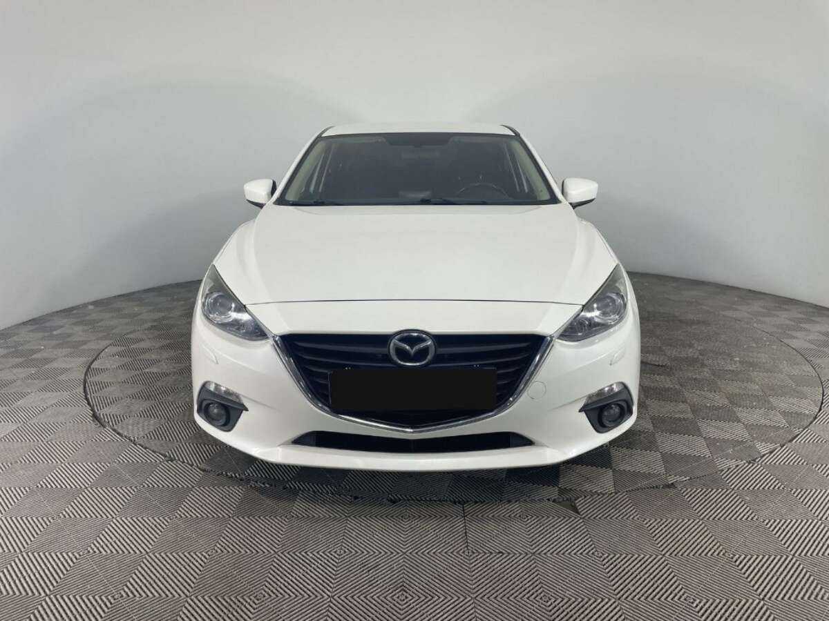 Mazda 3 с пробегом — 2014 год. Фото: #1