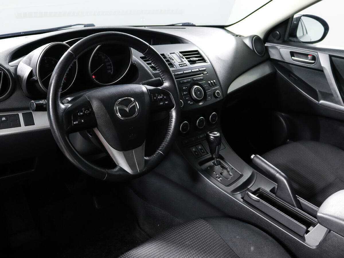 Mazda 3 с пробегом — 2013 год. Фото: #13