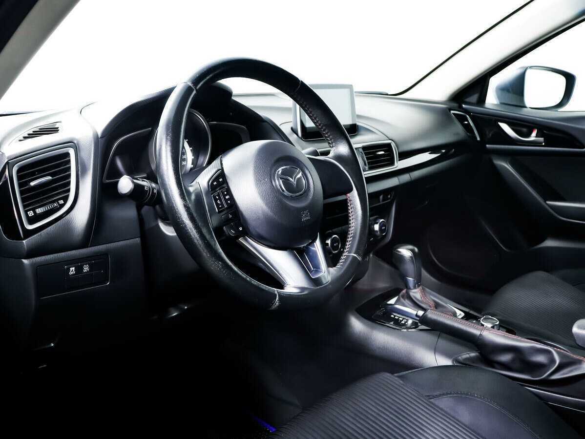 Mazda 3 с пробегом — 2013 год. Фото: #10