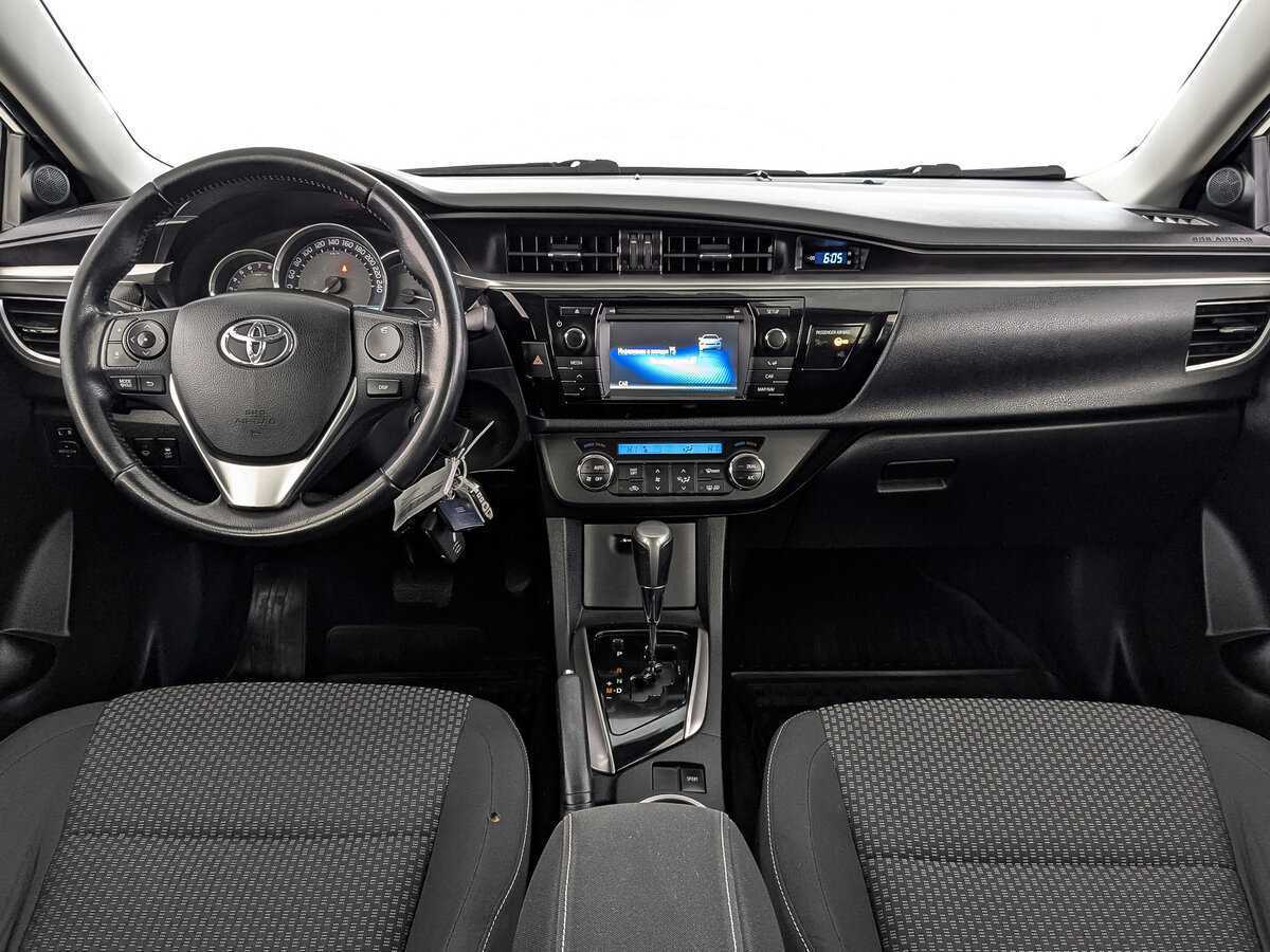Toyota Corolla с пробегом — 2014 год. Фото: #11
