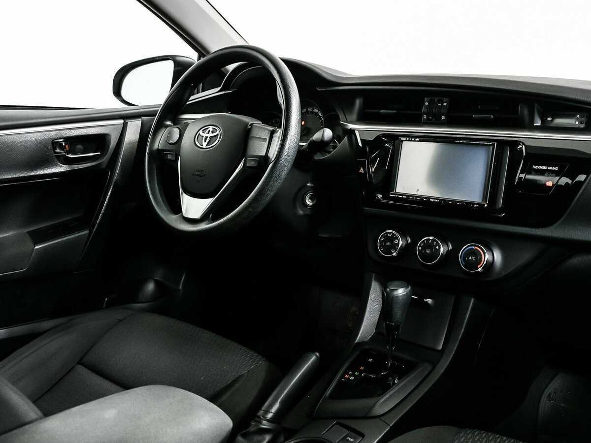 Toyota Corolla с пробегом — 2013 год. Фото: #8