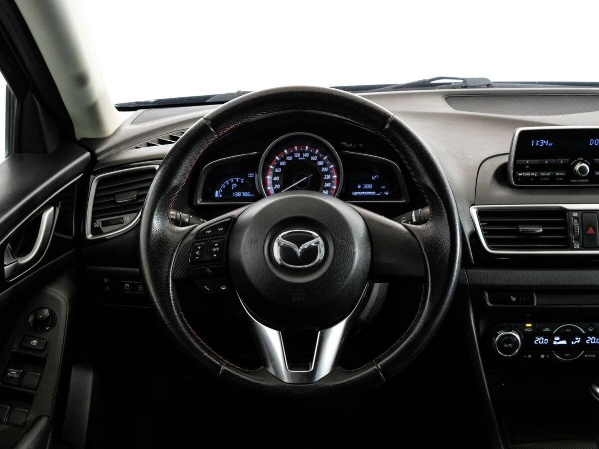 Mazda 3 с пробегом — 2013 год. Фото: #10