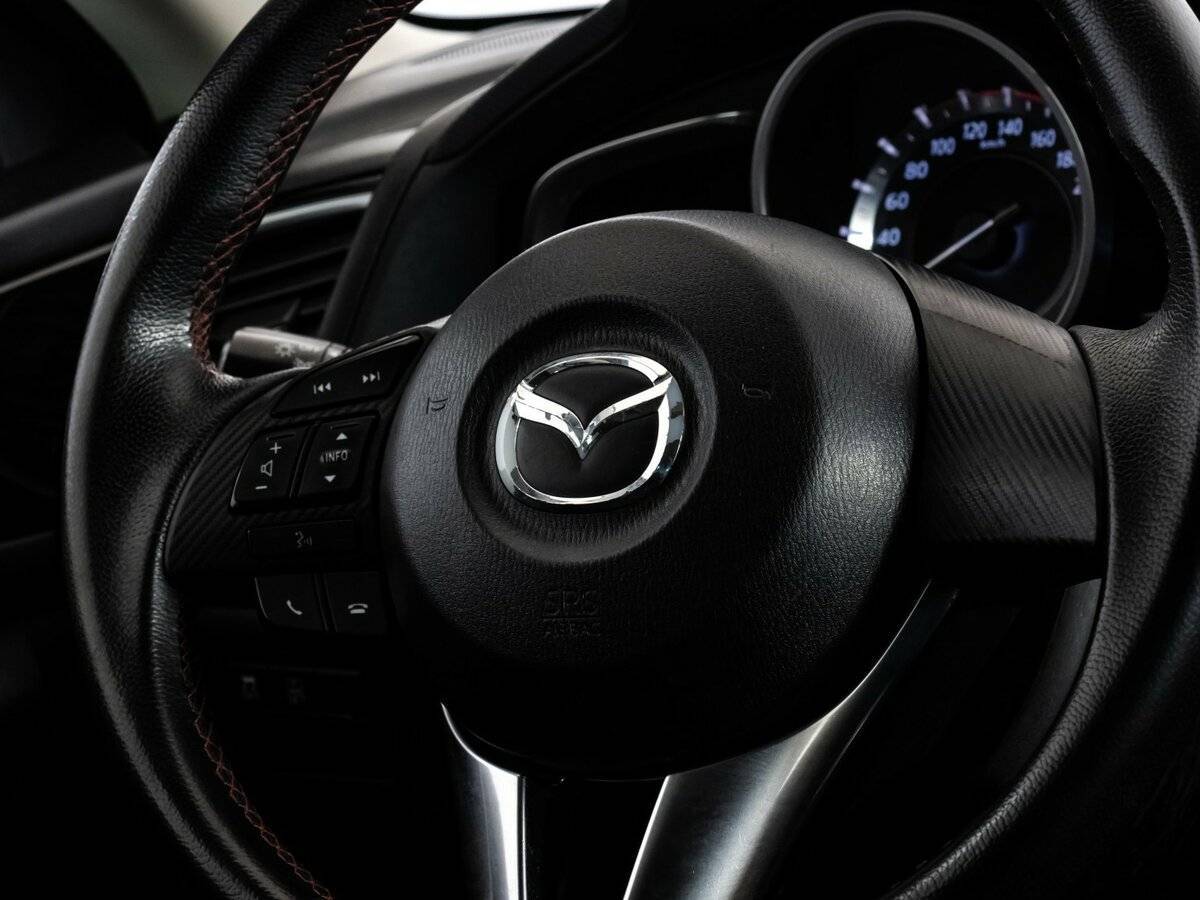 Mazda 3 с пробегом — 2013 год. Фото: #11