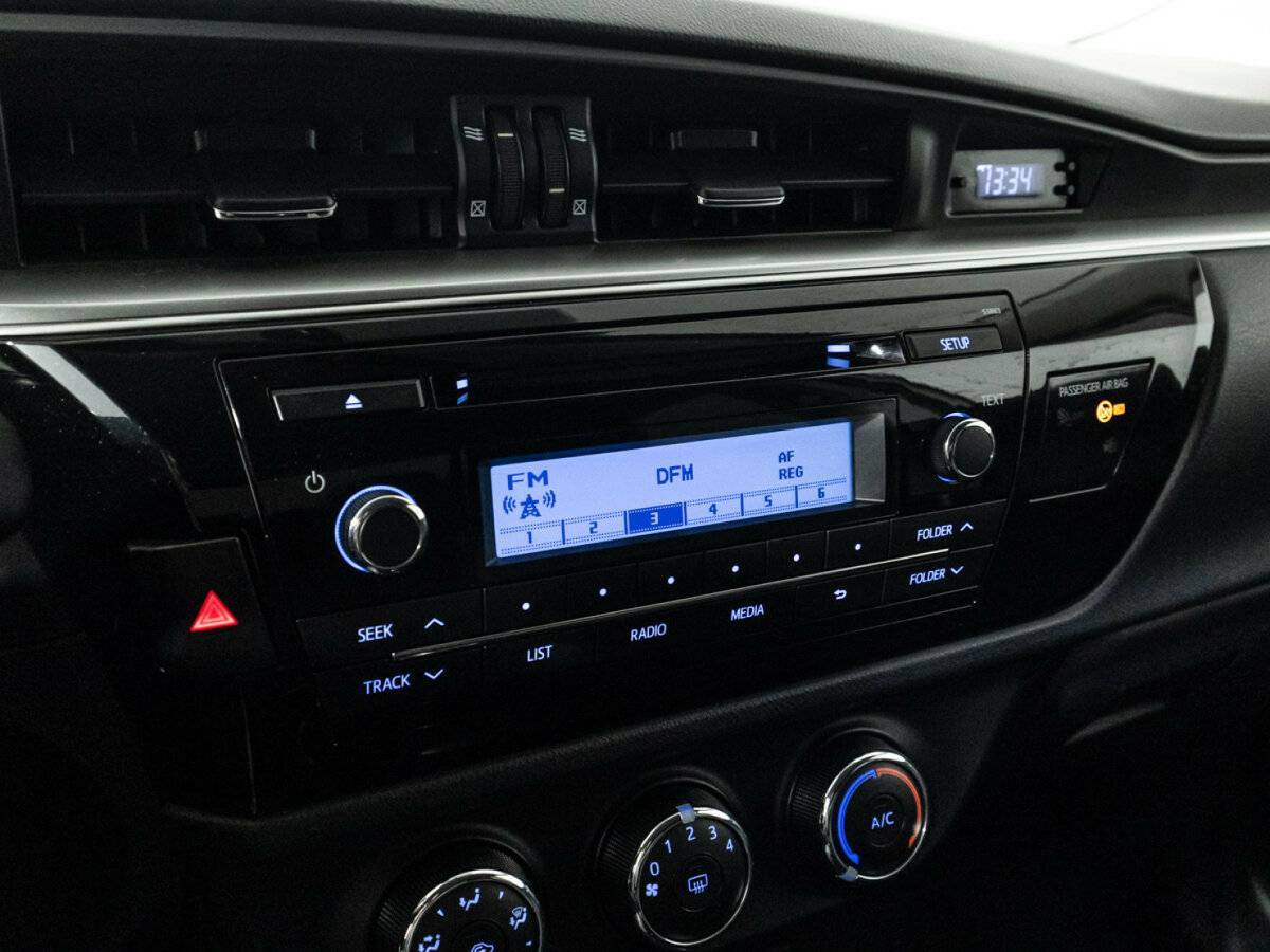 Toyota Corolla с пробегом — 2013 год. Фото: #15