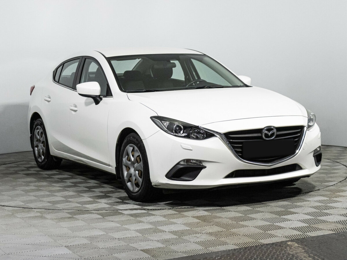 Mazda 3 с пробегом — 2014 год. Фото: #2