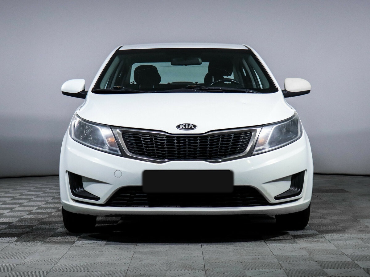 Kia Rio с пробегом — 2014 год. Фото: #1